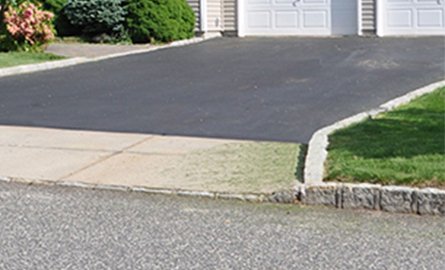 closeup of curb cut on a driveway